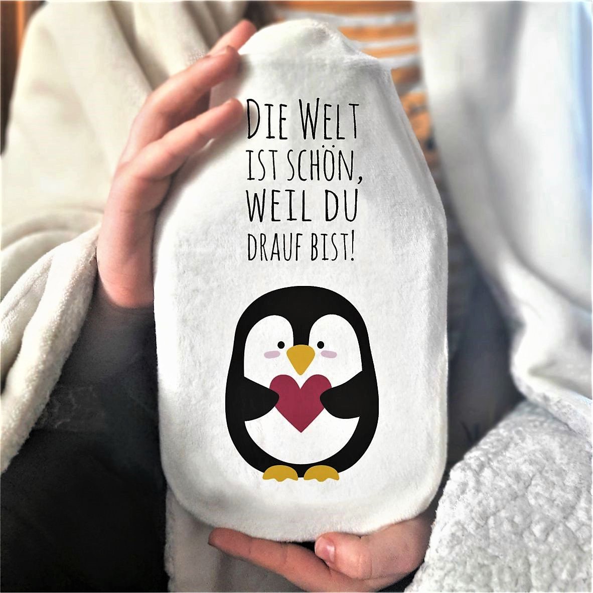 Wärmflasche Pinguin "Die Welt ist schön, weil du drauf bist!"