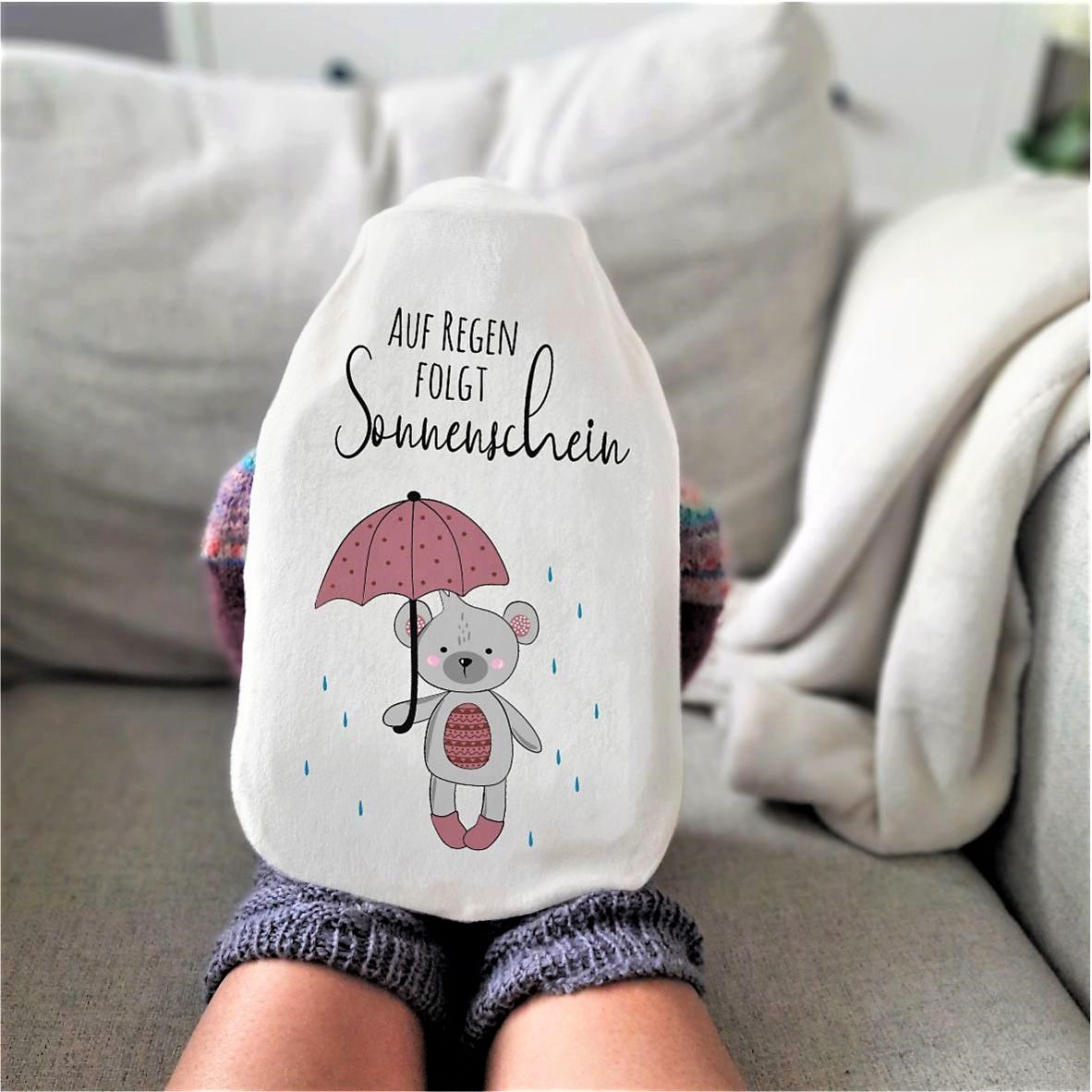 Wärmflasche Bär mit Regenschirm "Auf Regen folgt Sonnenschein"